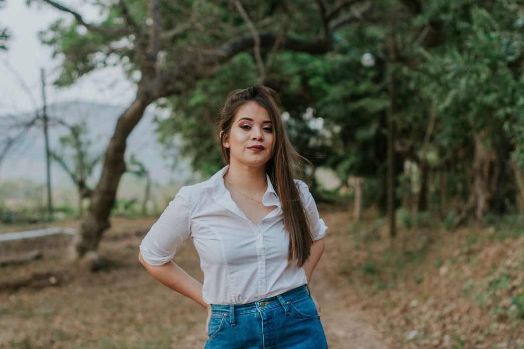 Woman Standing Near Trees