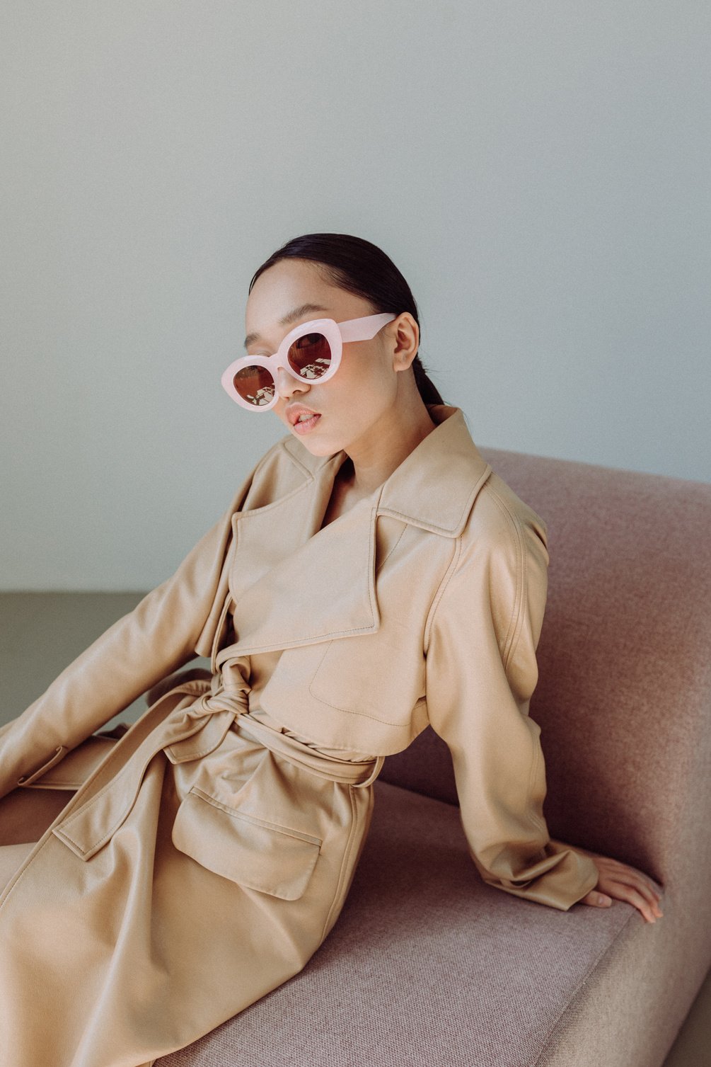 Woman in Trench Coat with Sunglasses